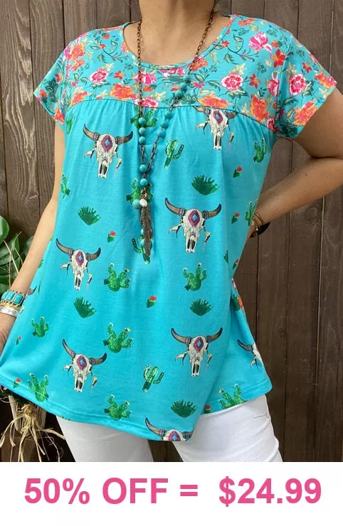 Turquoise steer print top with floral back